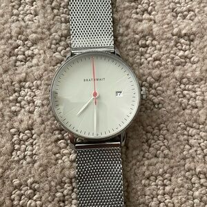 Brathwait Watch NWOT with date code, slim wrist watch. Needs new battery.